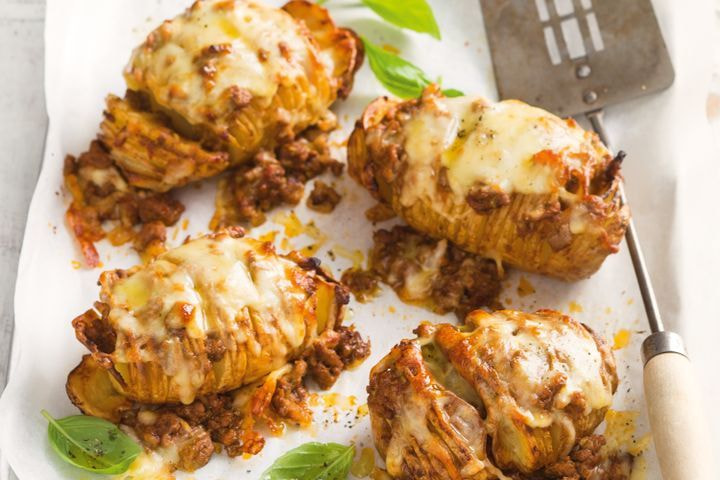 Pesto bolognese hasselback potatoes