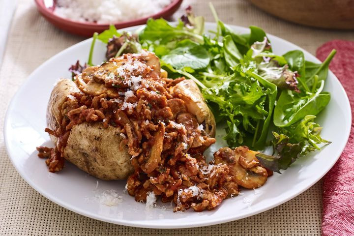 Jacket potatoes with pork and mushroom ragu